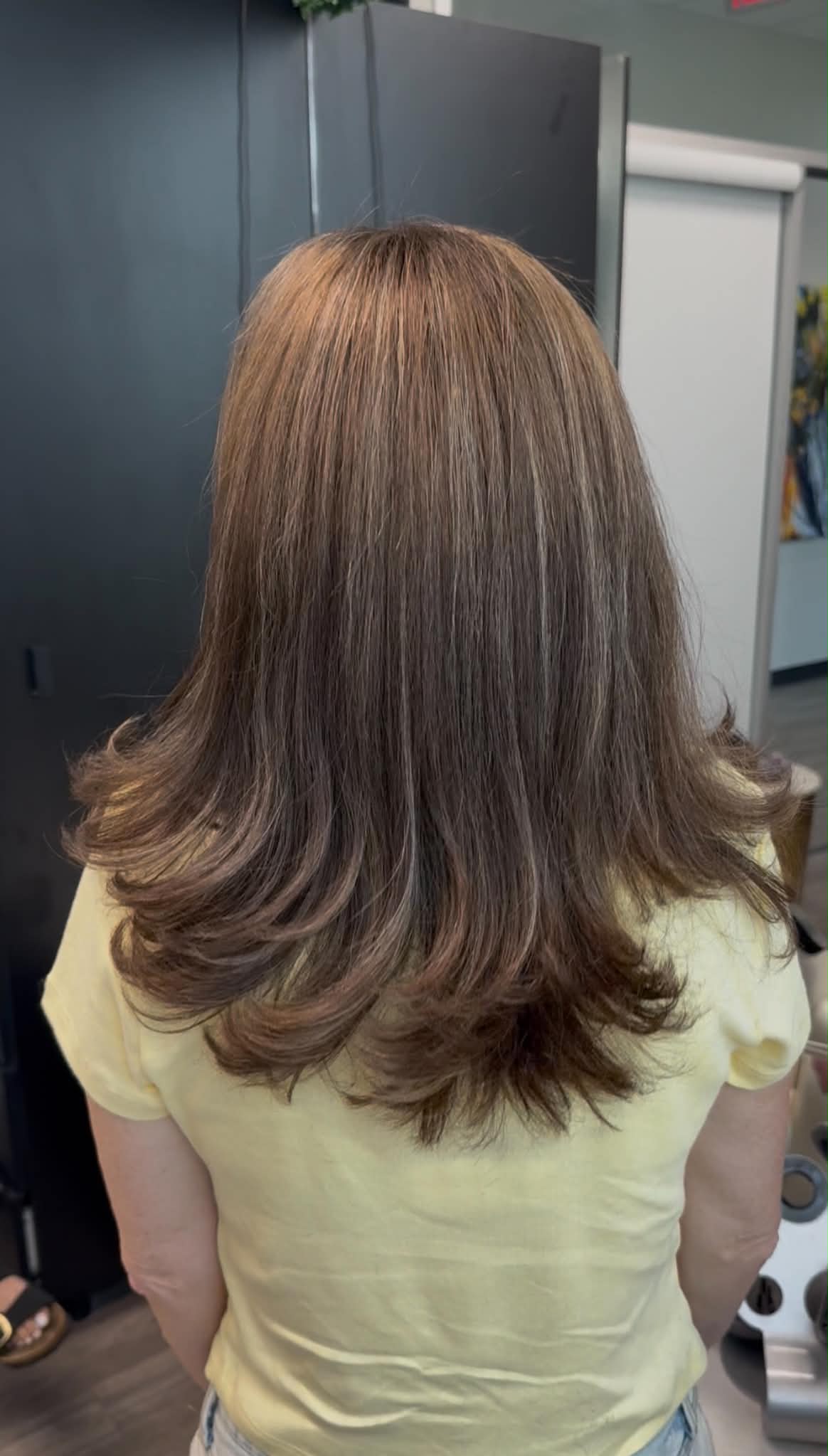 Medium brunette cut with soft movement through the ends